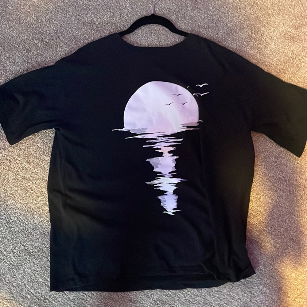 Moon setting on ocean Graphic T